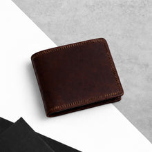 Load image into Gallery viewer, Brown leather wallet on a gray and white background