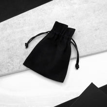 Load image into Gallery viewer, Black luxury Parker &amp; Co. Small cotton gift bag, styled on a modern monochrome background.